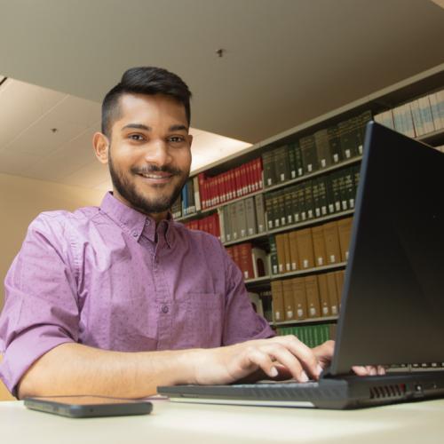 Young man working on a laptop