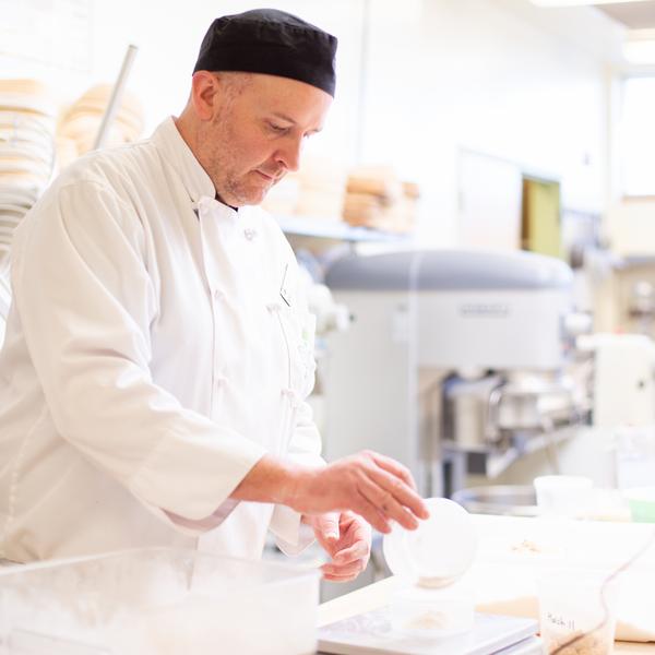 a chef prepares food in the bakery