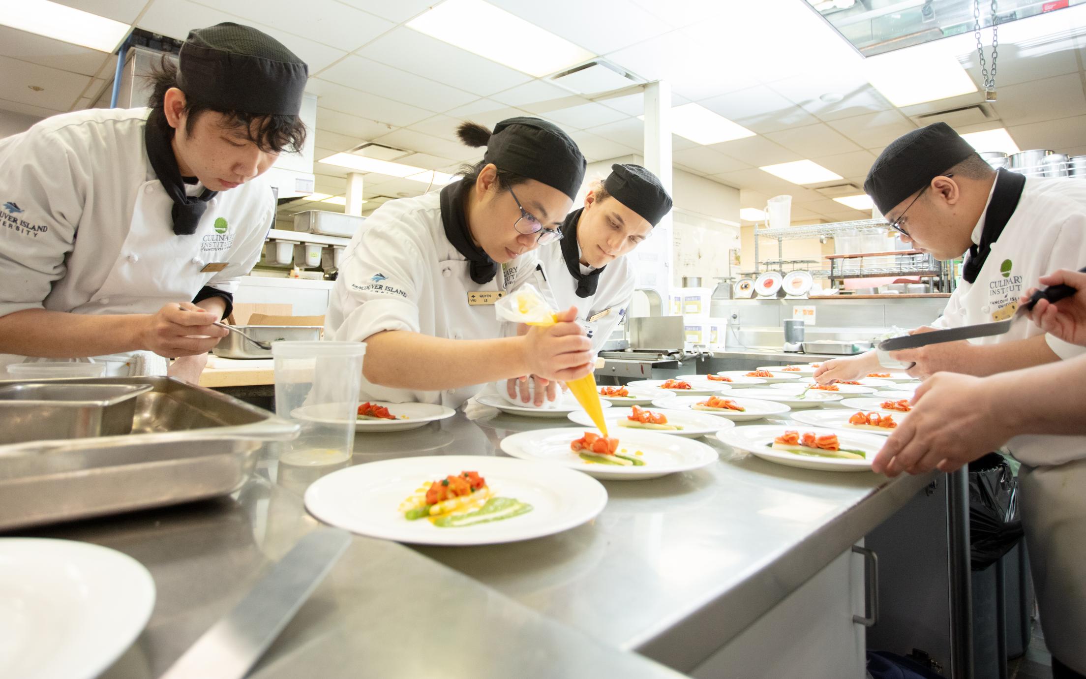 VIU culinary students plate dishes 